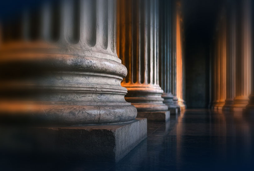 Solid stone base of classical pillar symbolizing strong financial foundation.
